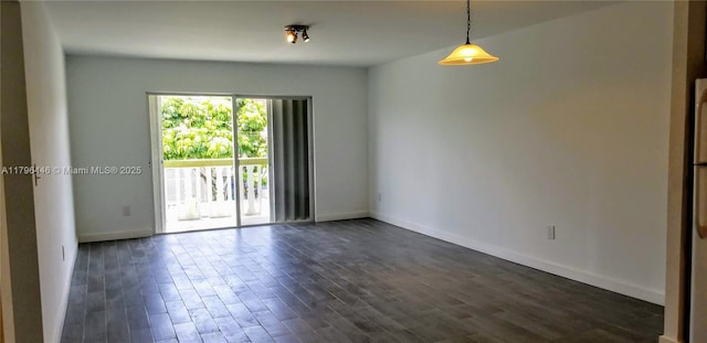 15205 NE 6th Ave Unit D204, Miami, FL 33162 - unfurnished room featuring baseboards and dark wood-type flooring