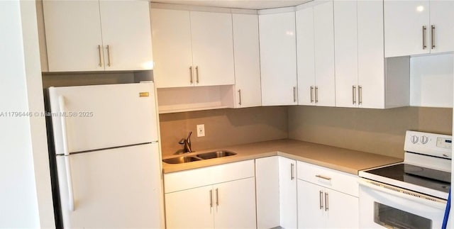 15205 NE 6th Ave Unit D204, Miami, FL 33162 - kitchen featuring light countertops, white cabinetry, a sink, and white appliances