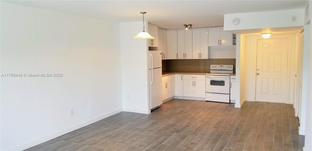 15205 NE 6th Ave Unit D204, Miami, FL 33162 - kitchen with decorative light fixtures, white cabinetry, wood finished floors, and white appliances