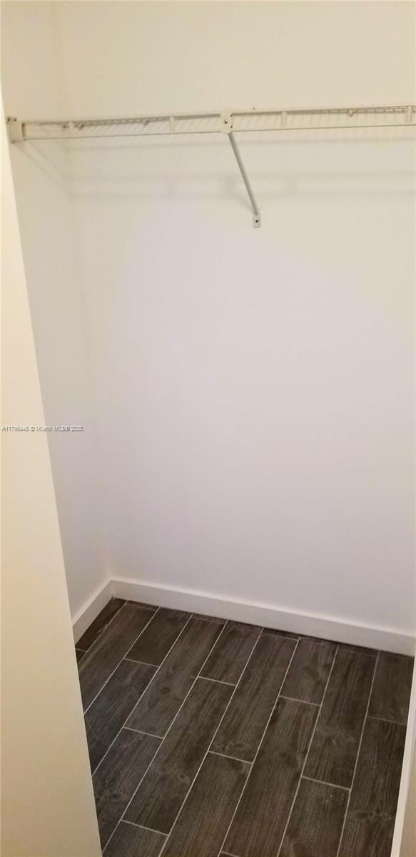 15205 NE 6th Ave Unit D204, Miami, FL 33162 - spacious closet featuring wood tiled floor