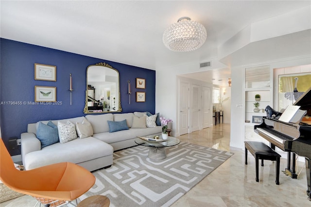 429 Hendricks Isle, Fort Lauderdale, FL 33301 - living area with marble tiled flooring and a chandelier