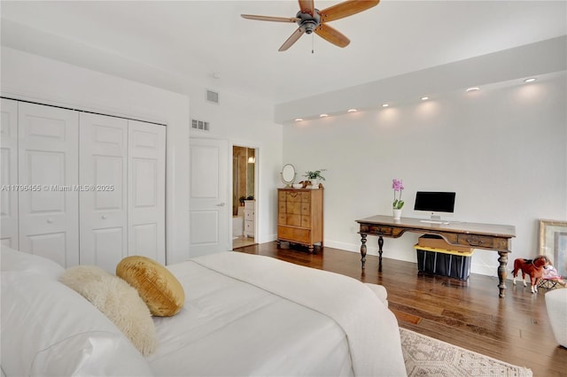 429 Hendricks Isle, Fort Lauderdale, FL 33301 - bedroom featuring wood finished floors, a closet, an office area, a ceiling fan, and baseboards