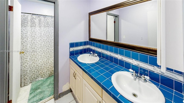 18231 SW 90th Ct, Palmetto Bay, FL 33157 - full bathroom with a sink, double vanity, and curtained shower