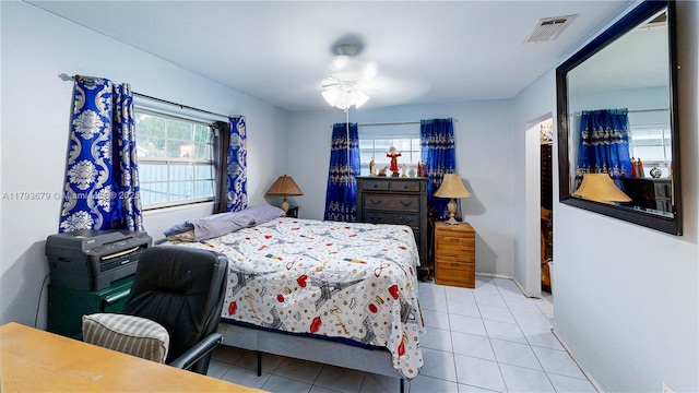 18231 SW 90th Ct, Palmetto Bay, FL 33157 - tiled bedroom with baseboards and visible vents