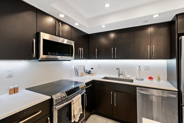 4000 Towerside Ter Unit 704, Miami, FL 33138 - kitchen with recessed lighting, light countertops, appliances with stainless steel finishes, and a sink