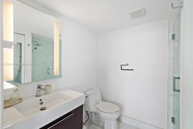 4000 Towerside Ter Unit 704, Miami, FL 33138 - bathroom with vanity, toilet, a marble finish shower, and visible vents