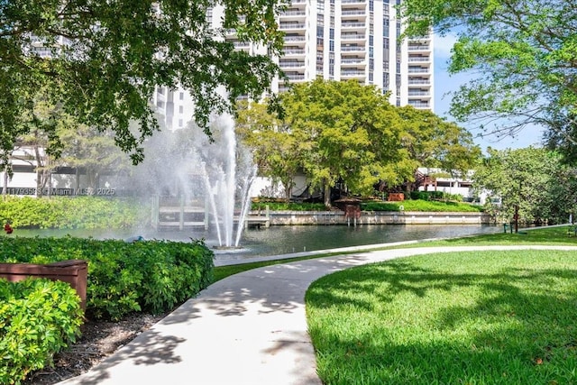 4000 Towerside Ter Unit 704, Miami, FL 33138 - view of community featuring a yard and a water view