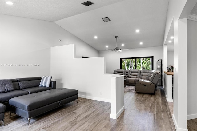 11377 NW 21st Ct, Coral Springs, FL 33071 - living area featuring ceiling fan, lofted ceiling, wood finished floors, recessed lighting, and baseboards