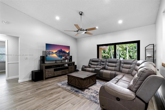 11377 NW 21st Ct, Coral Springs, FL 33071 - living area with light wood-type flooring, a ceiling fan, baseboards, lofted ceiling, and recessed lighting