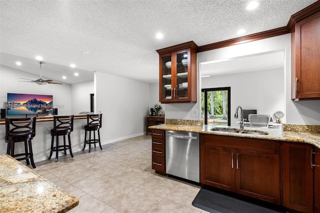 11377 NW 21st Ct, Coral Springs, FL 33071 - kitchen featuring dishwasher, a sink, recessed lighting, glass insert cabinets, and light stone counters