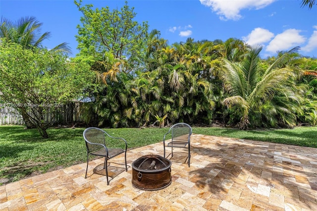 11377 NW 21st Ct, Coral Springs, FL 33071 - view of patio with an outdoor fire pit