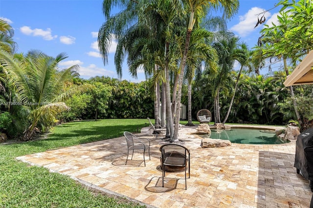 11377 NW 21st Ct, Coral Springs, FL 33071 - view of patio / terrace with an outdoor pool and a fire pit