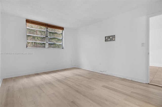 716 Michigan Ave Unit 204, Miami Beach, FL 33139 - empty room with light wood-style floors and baseboards