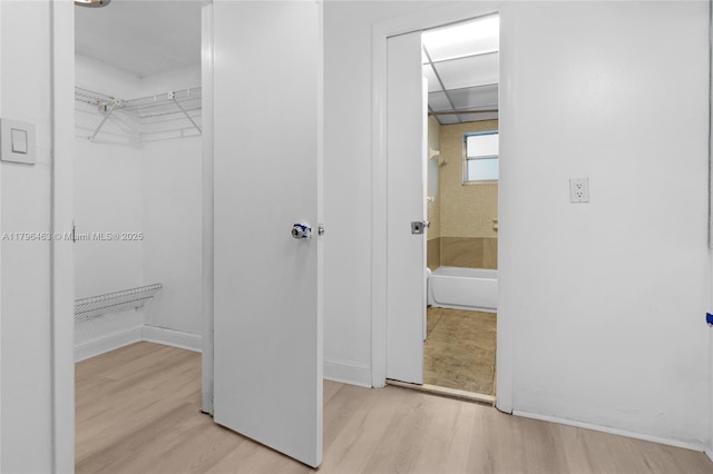 716 Michigan Ave Unit 204, Miami Beach, FL 33139 - spacious closet featuring wood finished floors