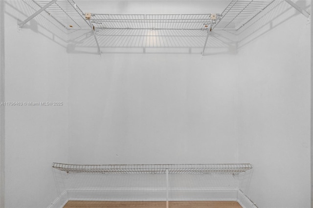 716 Michigan Ave Unit 204, Miami Beach, FL 33139 - spacious closet featuring wood finished floors