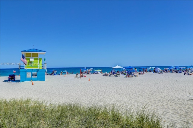 property view of water featuring a view of the beach