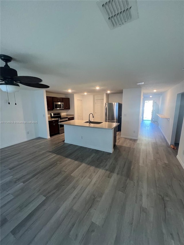 203 Palmwood Dr, Palm Coast, FL 32164 - kitchen with a sink, open floor plan, visible vents, and appliances with stainless steel finishes