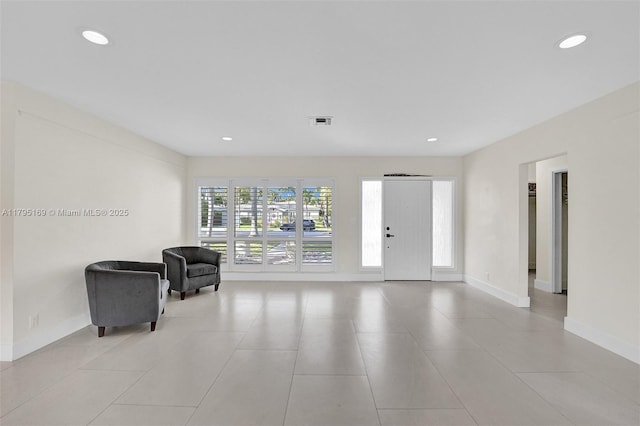 1438 Harrison St, Hollywood, FL 33020 - foyer entrance featuring recessed lighting, baseboards, and light tile patterned floors