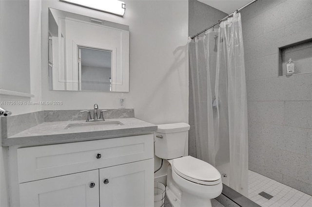 1438 Harrison St, Hollywood, FL 33020 - full bath with toilet, vanity, and a tile shower
