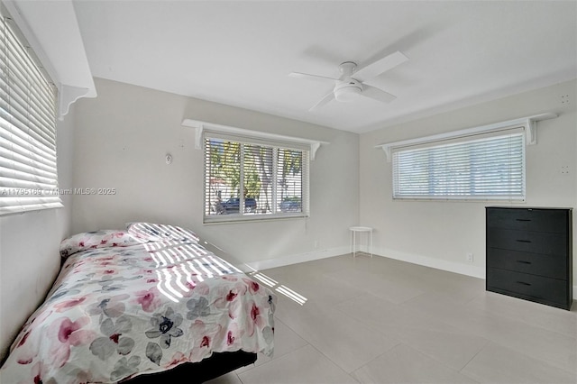 1438 Harrison St, Hollywood, FL 33020 - tiled bedroom featuring ceiling fan