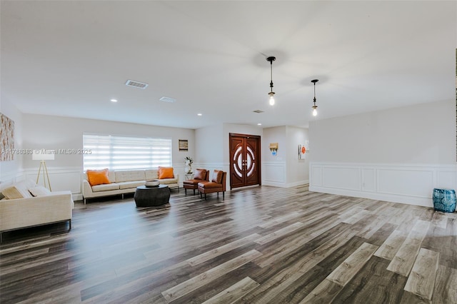 13305 SW 22nd Ter, Miami, FL 33175 - living room featuring wood finished floors, a wainscoted wall, visible vents, a decorative wall, and recessed lighting