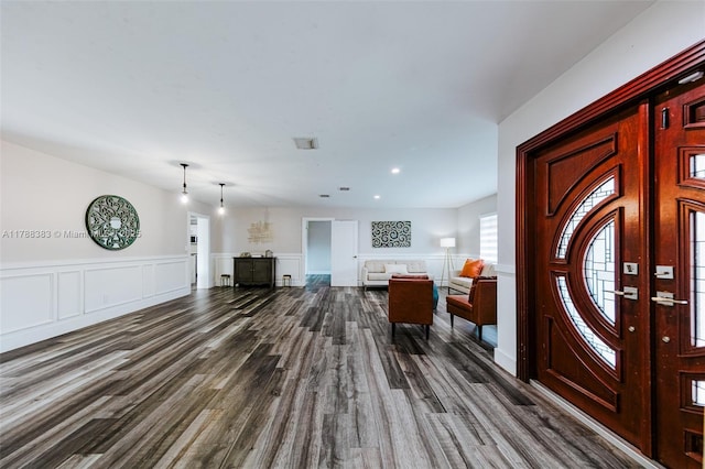 13305 SW 22nd Ter, Miami, FL 33175 - entrance foyer with a decorative wall, a wainscoted wall, and dark wood-style flooring