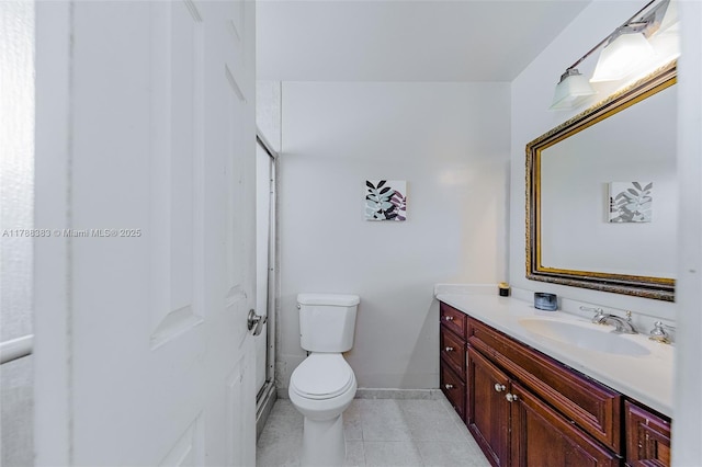 13305 SW 22nd Ter, Miami, FL 33175 - bathroom with toilet, tile patterned flooring, vanity, and baseboards