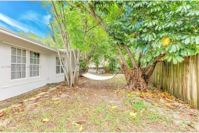 view of yard featuring fence