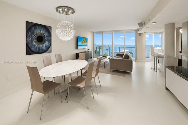 1900 Sunset Harbour Dr Unit 2008, Miami Beach, FL 33139 - dining space featuring a chandelier and expansive windows