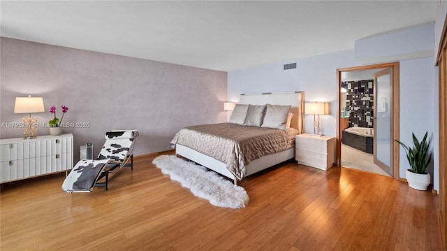 1900 Sunset Harbour Dr Unit 2008, Miami Beach, FL 33139 - bedroom featuring visible vents, wood finished floors, and baseboards