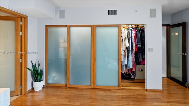1900 Sunset Harbour Dr Unit 2008, Miami Beach, FL 33139 - interior space featuring a closet, visible vents, light wood finished floors, a walk in closet, and baseboards