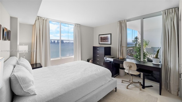 1900 Sunset Harbour Dr Unit 2008, Miami Beach, FL 33139 - bedroom with a water view and light carpet