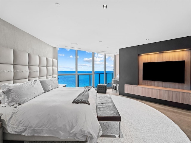 3101 S Ocean Dr Unit 2905, Hollywood, FL 33019 - bedroom with floor to ceiling windows, wood finished floors, and access to outside