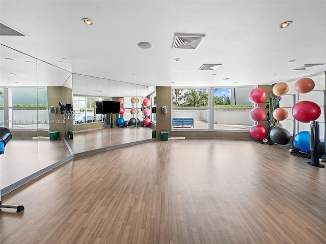 3101 S Ocean Dr Unit 2905, Hollywood, FL 33019 - exercise room featuring wood finished floors and recessed lighting