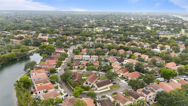 aerial view with a water view and a residential view