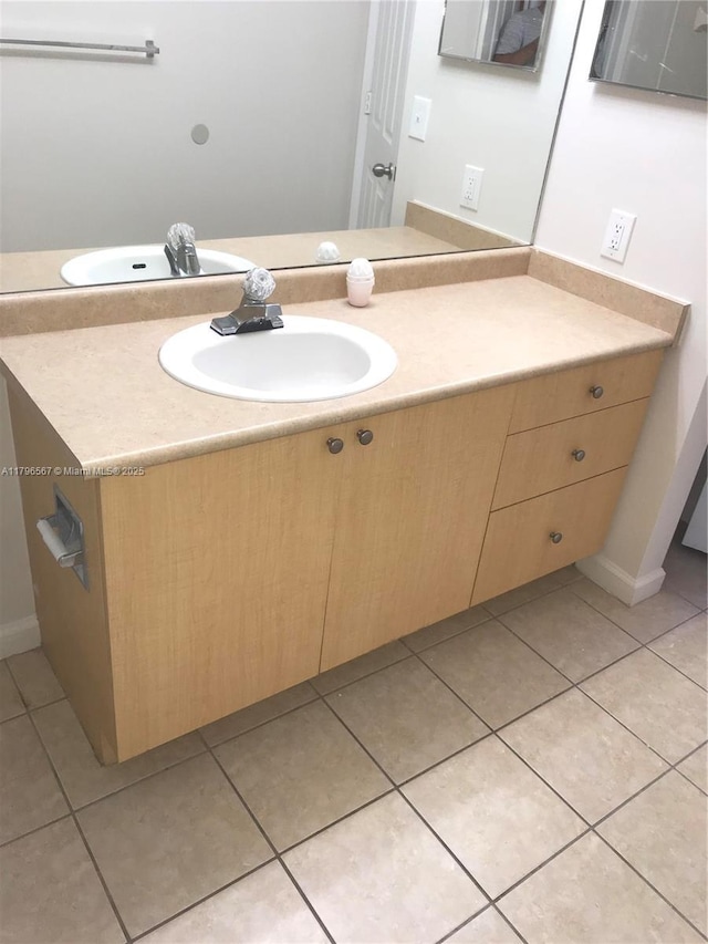 bathroom featuring vanity and tile patterned floors