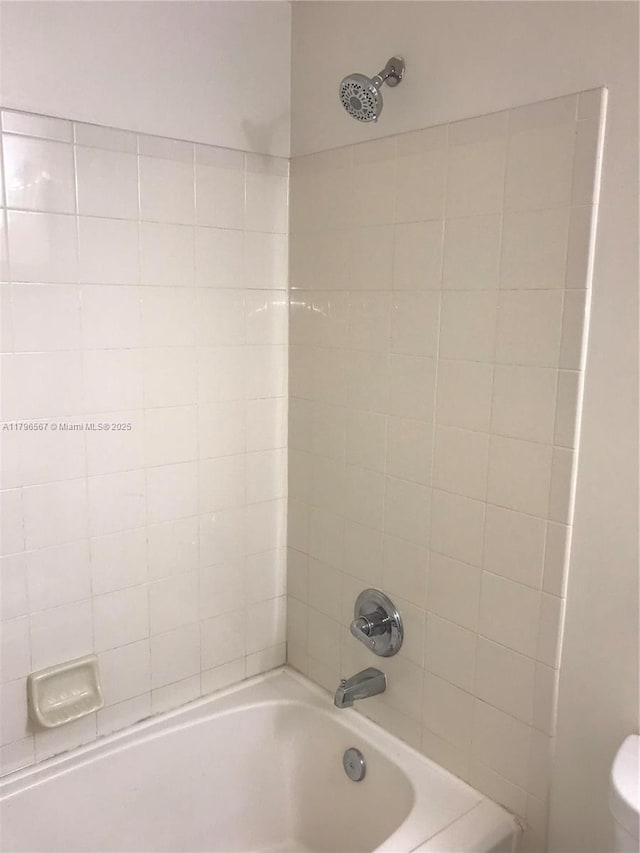 full bath with shower / washtub combination