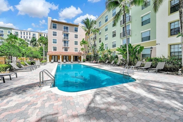 community pool with a patio