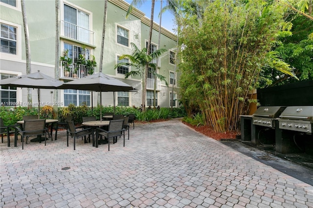 view of patio / terrace featuring outdoor dining area and area for grilling
