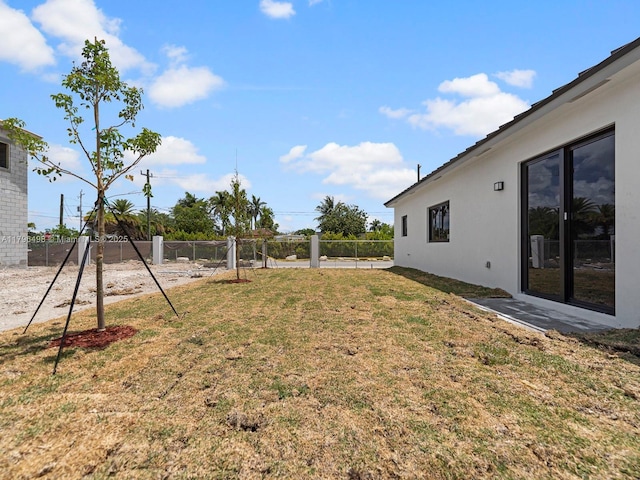 view of yard with fence