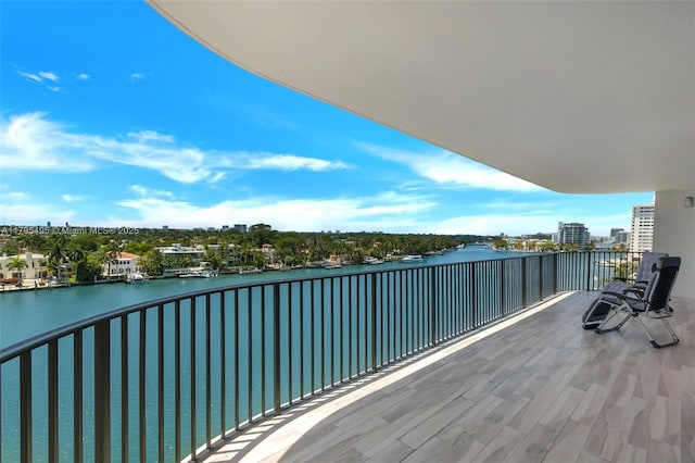 balcony featuring a water view