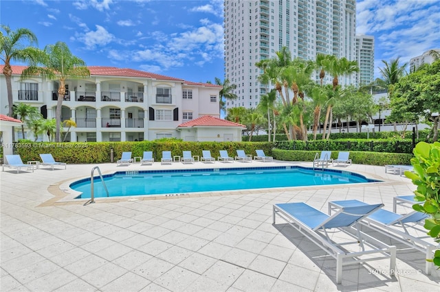 pool with a patio area