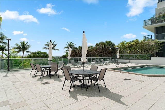 pool featuring a patio