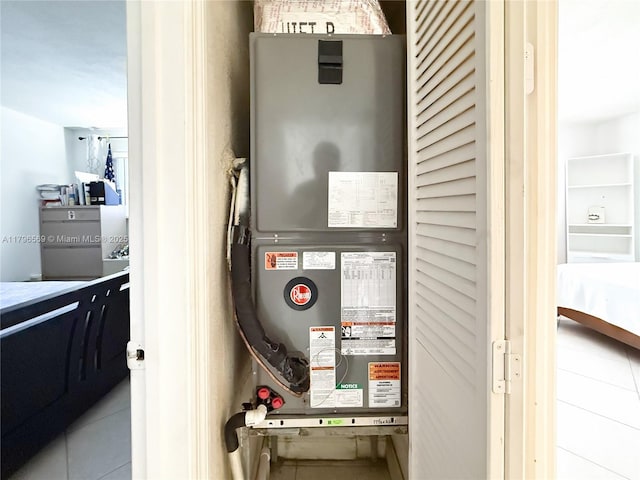 utility room with heating unit