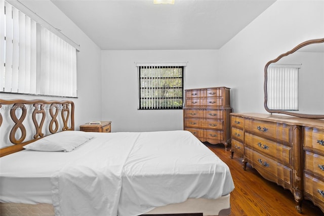 bedroom featuring wood finished floors