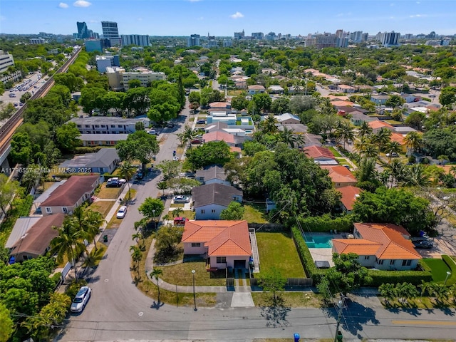 birds eye view of property with a city view