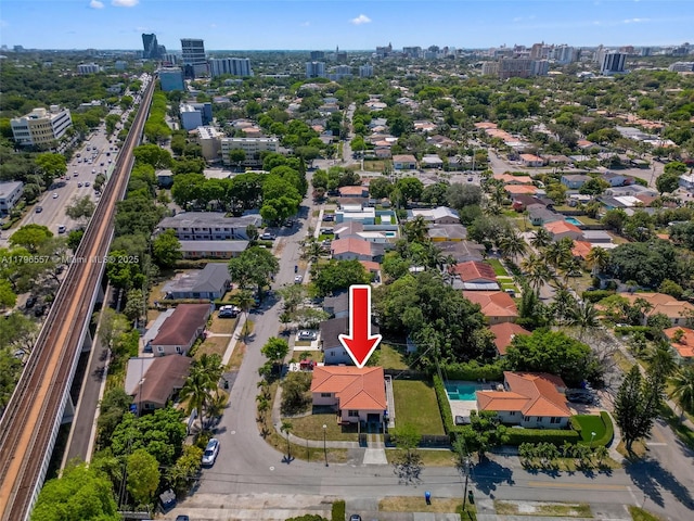drone / aerial view featuring a city view
