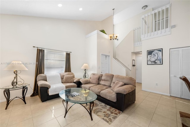 1249 NW 126th Ter, Sunrise, FL 33323 - living area with a towering ceiling, a chandelier, light tile patterned floors, baseboards, and recessed lighting
