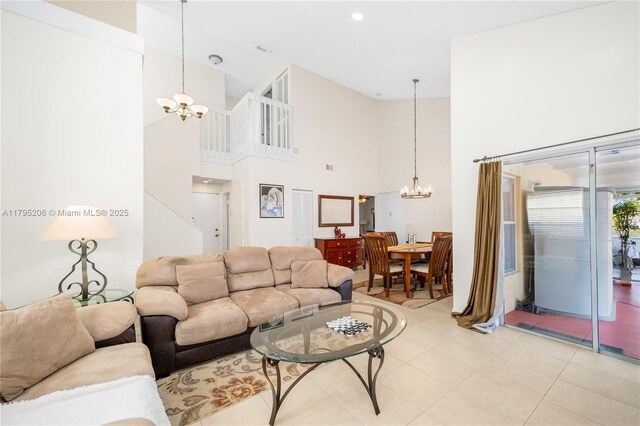 1249 NW 126th Ter, Sunrise, FL 33323 - living room featuring a chandelier, high vaulted ceiling, and light tile patterned floors