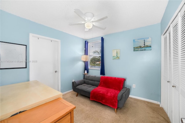 1249 NW 126th Ter, Sunrise, FL 33323 - living area with light colored carpet, ceiling fan, and baseboards